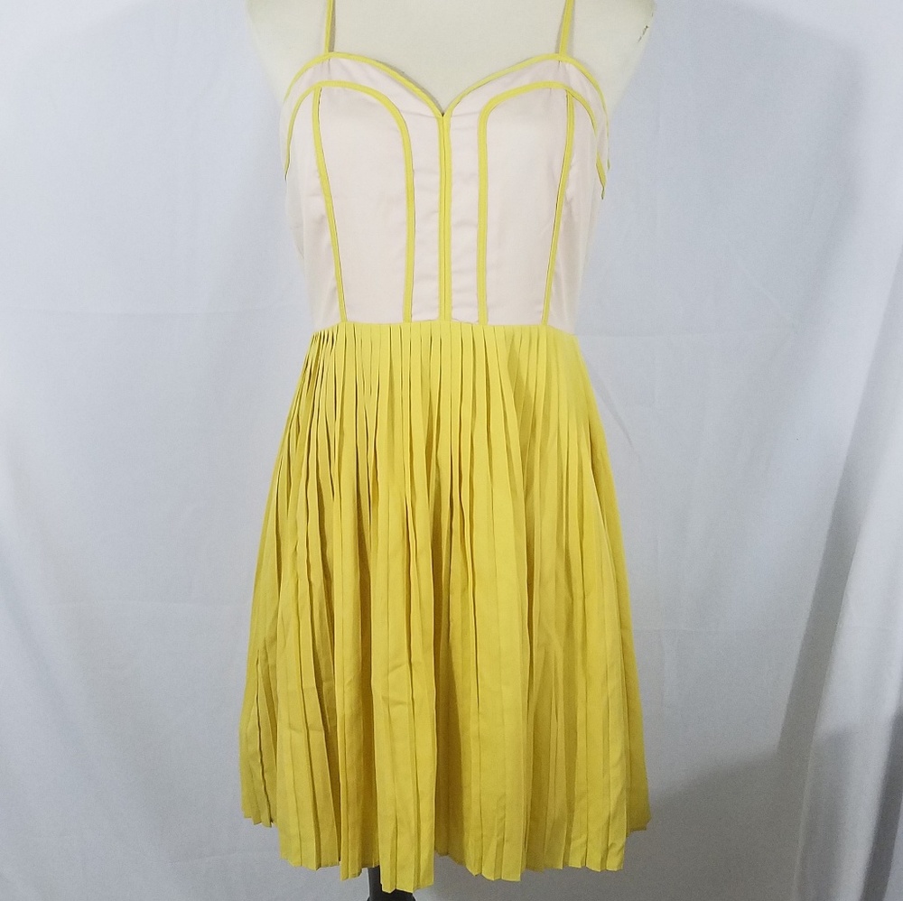ELLE vibrant yellow pleated dress